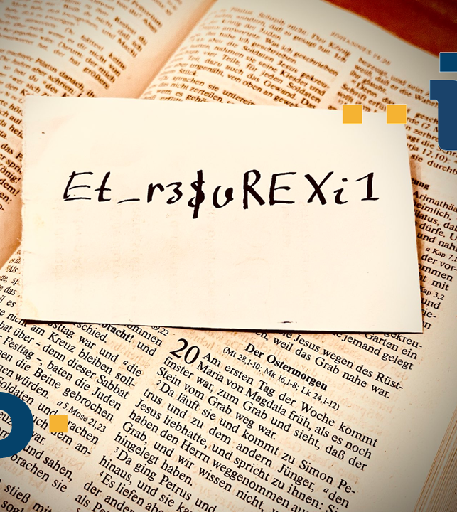 Das Bild zeigt einen Zettel in der Bibel, auf dem ein Passwort notiert ist.